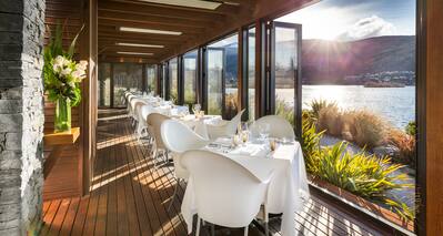 Wakatipu Grill Terrace, Linen Covered Dining Tables with Sea and Mountain Views