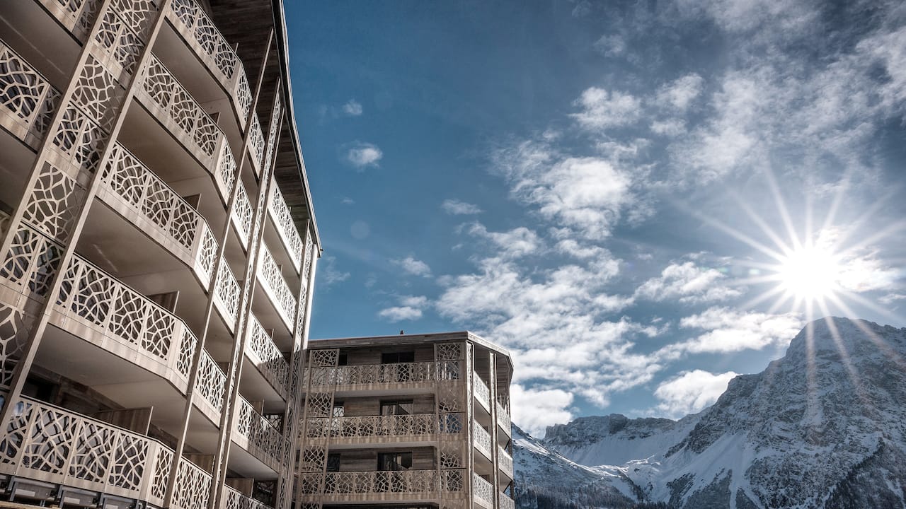 Hotel exterior with view of a mountain