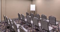 Meeting Room with Three Rows of Five Chairs